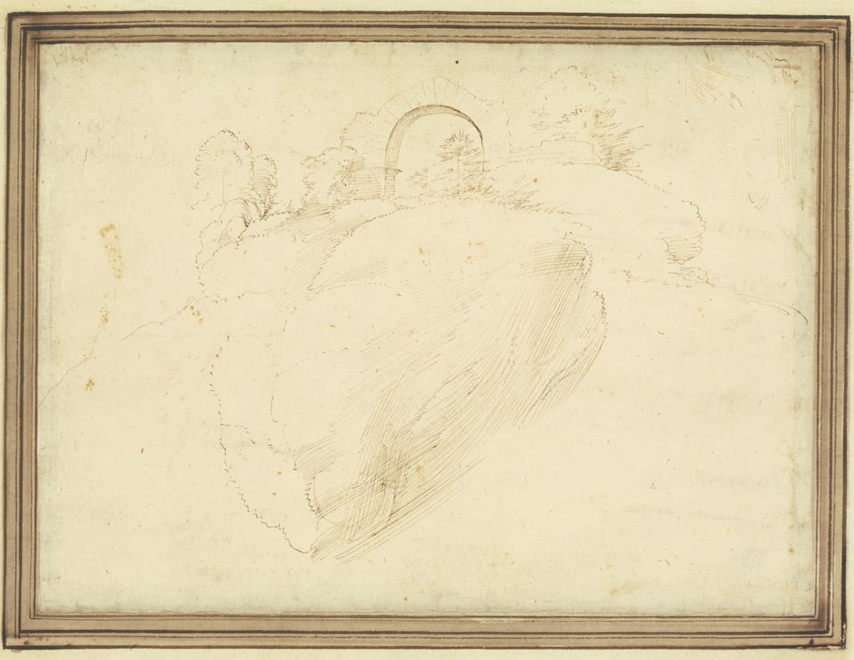 A Renaissance landscape drawing by Fra Bartolommeo featuring a ruined stone archway in the center. The scene includes rolling hills and scattered trees, conveying a quiet, pastoral setting. Rendered in brown ink on paper, the drawing is bordered with a double frame in dark brown ink and brush, mounted in the Gabburri Album with a red-edged trim.